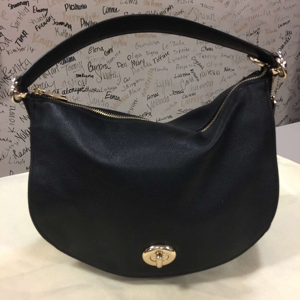 Pretty black and gold coach shoulder bag